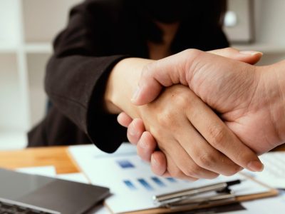 business partnership handshake concept. Photo of two businessmen handshaking process. Successful deal after great meeting.